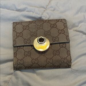 Gucci Brown Monogrammed Wallet with Gold Clasp